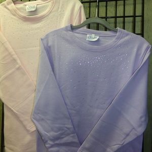 Pink and Purple sweaters